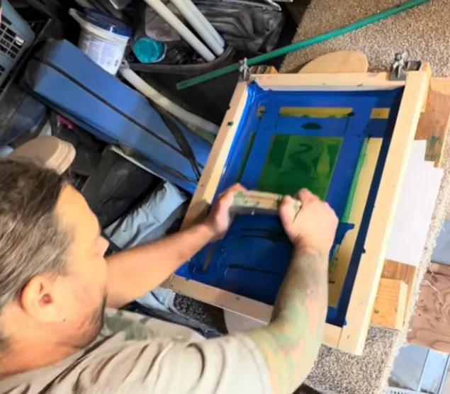 Hand screen-printing a River deck graphic